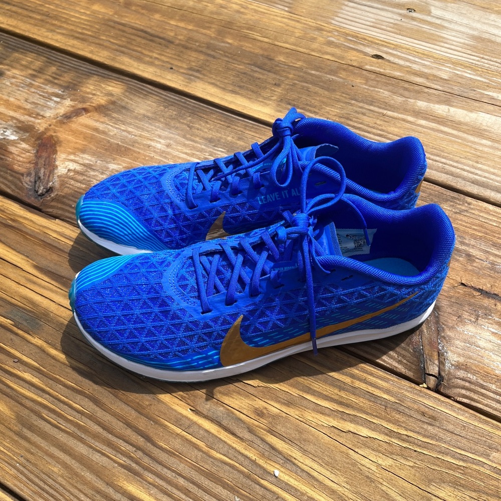 Nike Blue Sneakers with Gold Accents